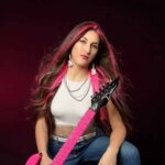 Candice Lee Turns the Situationship Era Into Sharp, Pink-Hued Pop-Rock on “Mr. E”